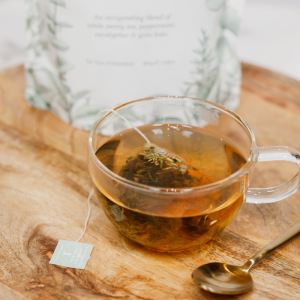 High Spirits White Mint Teabag in a glass cup