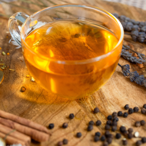 Inviting Sleep Golden Chai tea with ingredients in a cup