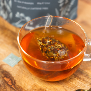 Inviting Sleep Golden Chai teabag in a glass cup